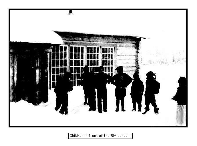Kids standing outside the BIA school in winter