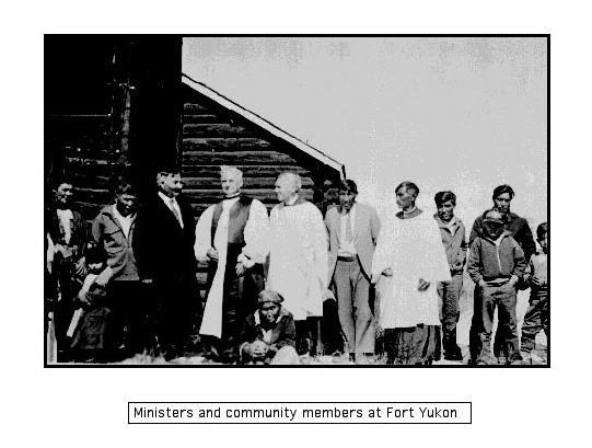 Ministers and community members standing outside in Fort Yukon