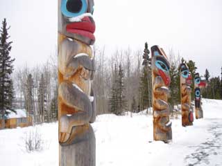 totem poles outside the Tlingit Heritage Center in Yukon territory