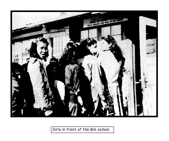 Picture of girls standing in front of the BIA school