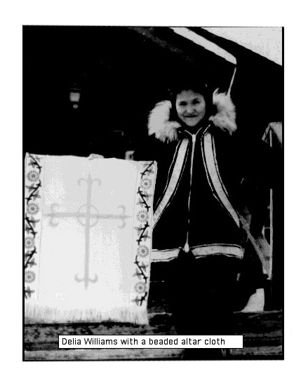 Picture of Delia Willams in a winter parka with a beaded alter cloth