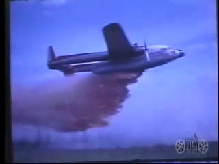 C-119 Aerial Tanker drops on Vundik Lake fire