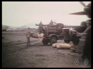 Loading bombs aboard B-24