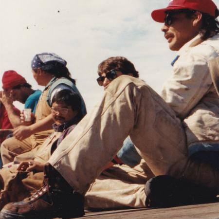 Crew Sitting on Dock